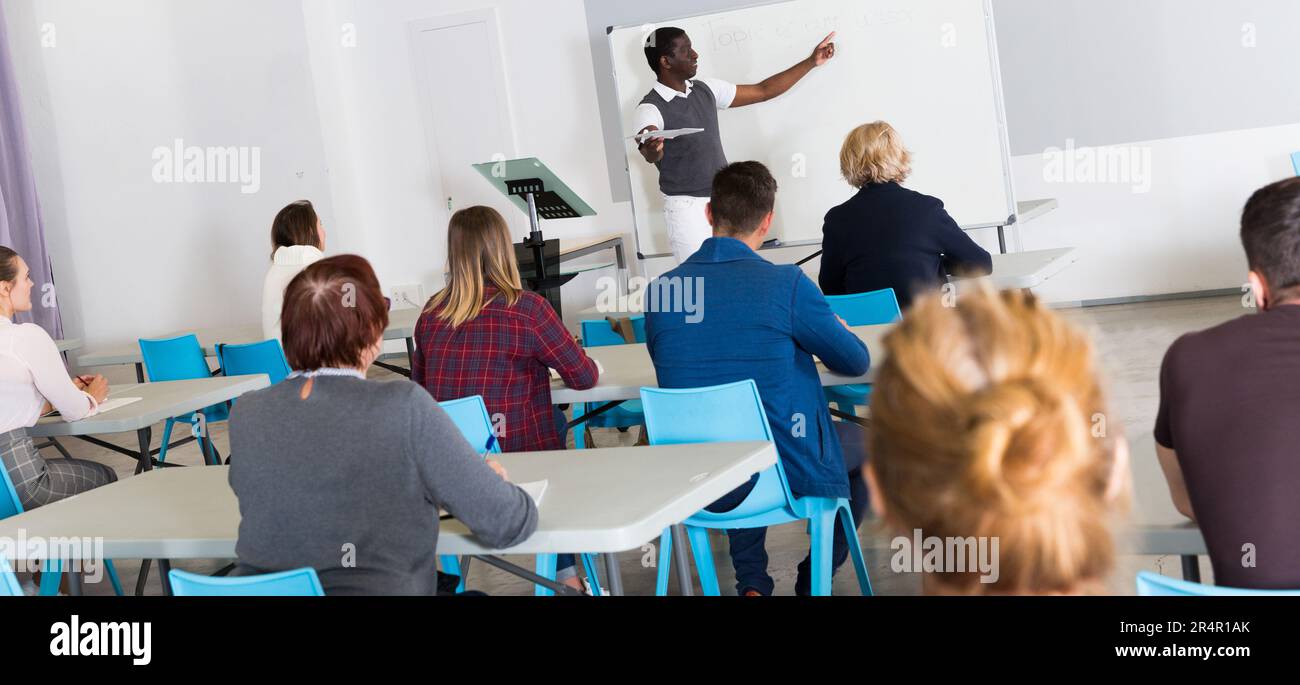 African American student answering at whiteboard Stock Photo - Alamy