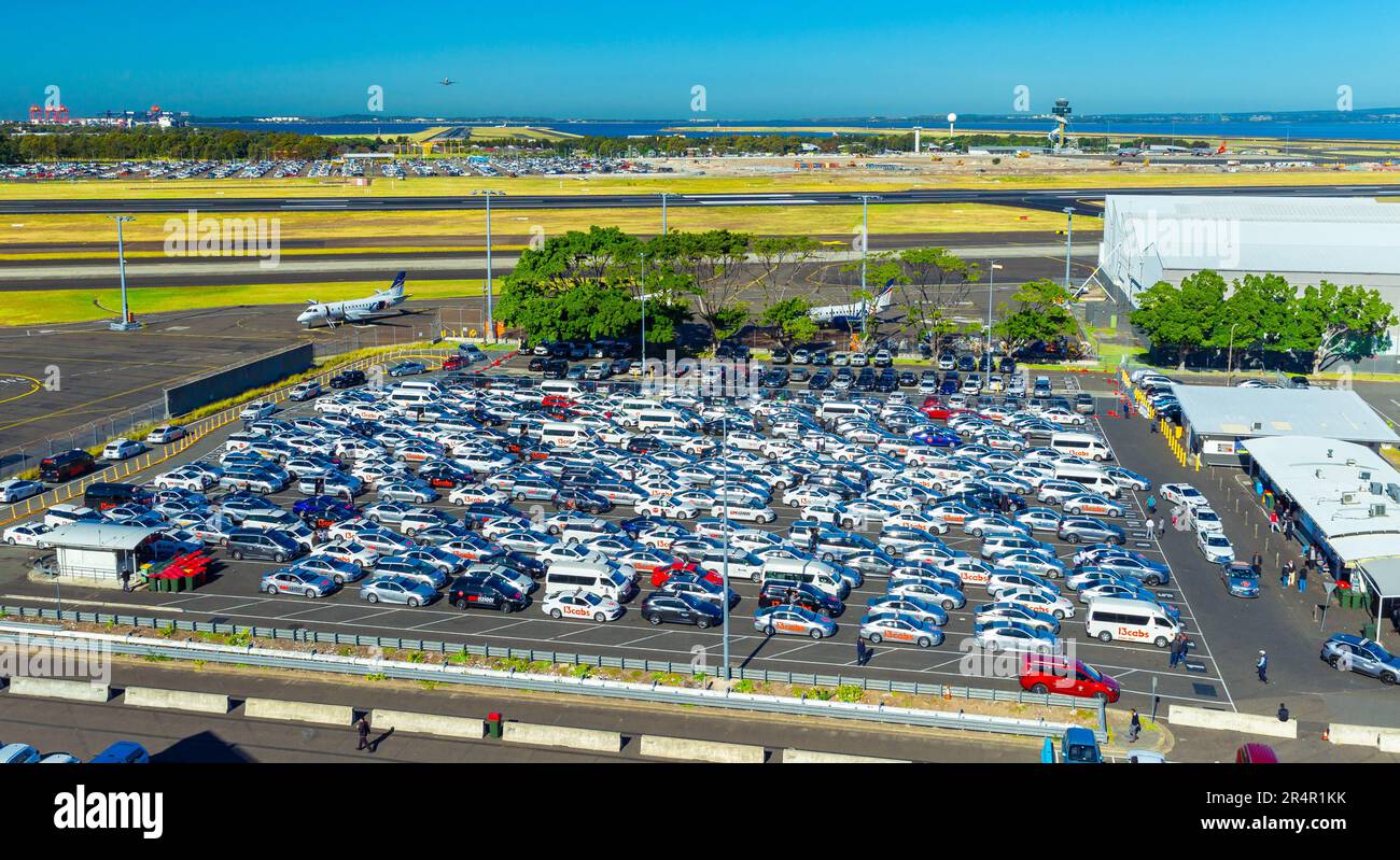 The taxi rank at the Domestic Terminal of Sydney (Kingsford Smith) Airport in Sydney, Australia, crowded with more than 200 waiting taxi cabs. Stock Photo