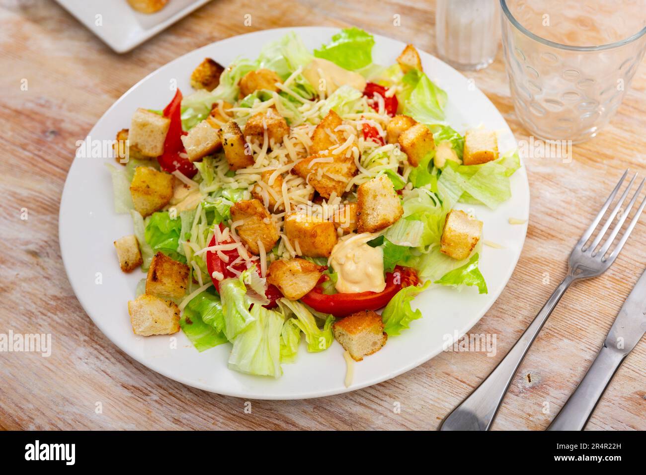 Popular dish of american cuisine is Caesar salad Stock Photo