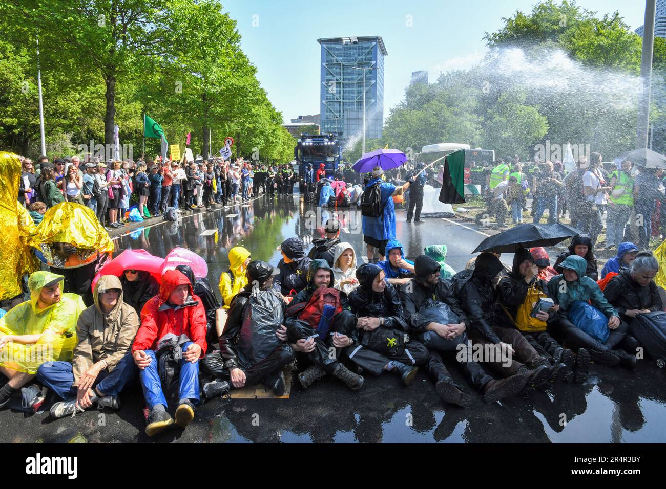 The Hague,The Netherlands,27th may 2023.Thousands of Extinction rebellion activists protesting by blocking the A12 motorway. The police used watercannons to end the demonstration.Over a thousand people were arrested Stock Photo