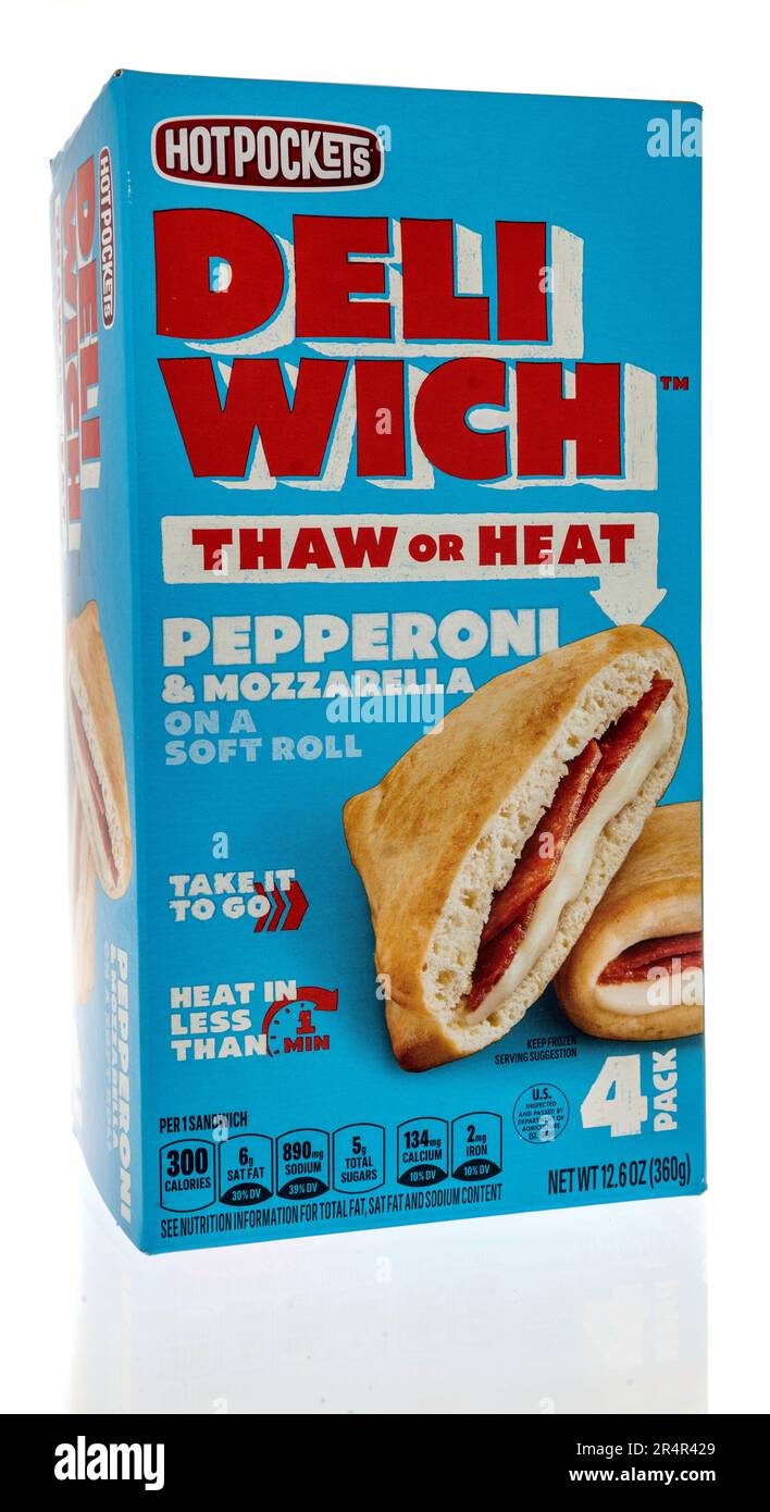 Winneconne, WI - 16 April 2023: A package of hot pockets deliwich pepperoni and mozzarella on a soft roll on an isolated background. Stock Photo