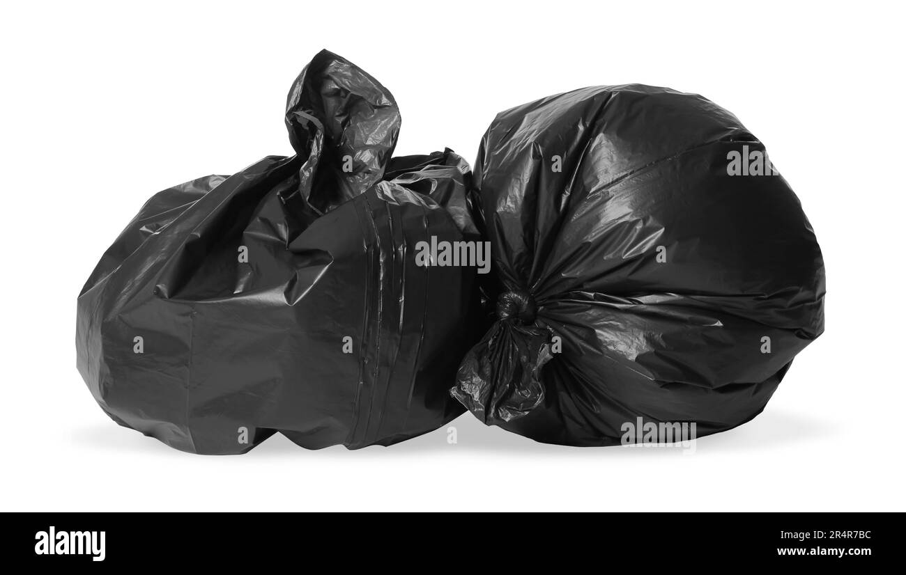 Trash bags full of garbage isolated on white Stock Photo Alamy