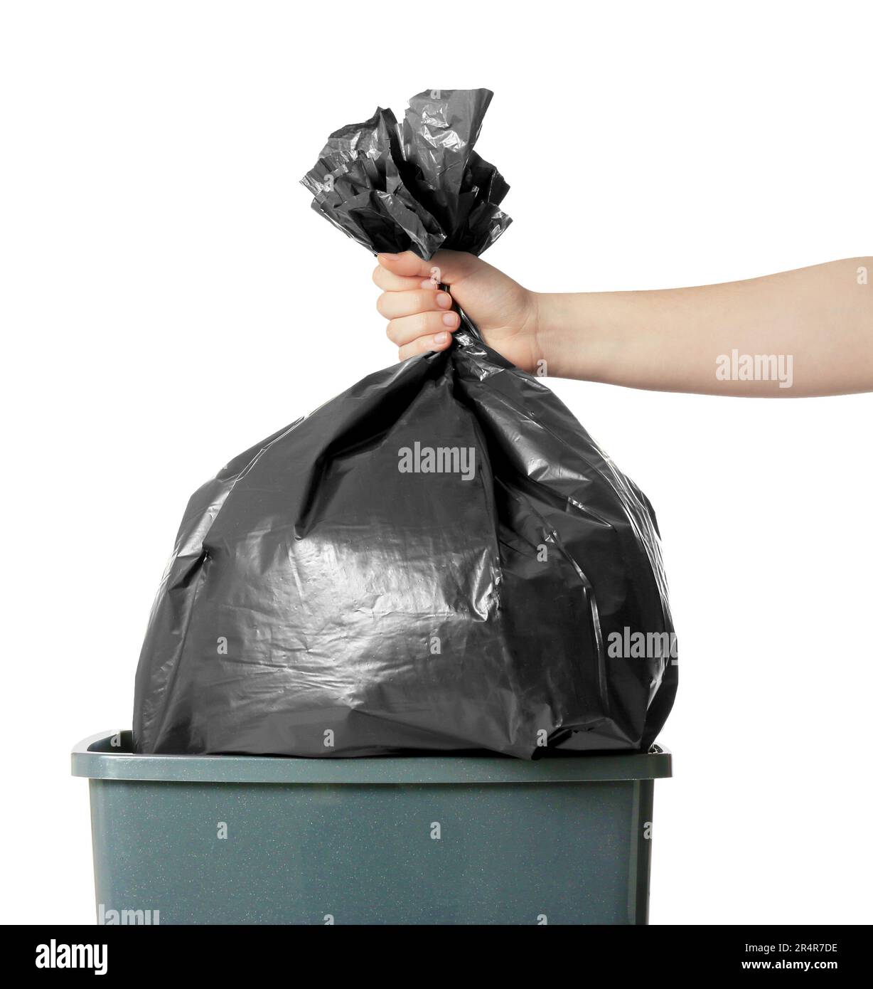https://c8.alamy.com/comp/2R4R7DE/woman-holding-trash-bag-full-of-garbage-over-bucket-on-white-background-closeup-2R4R7DE.jpg