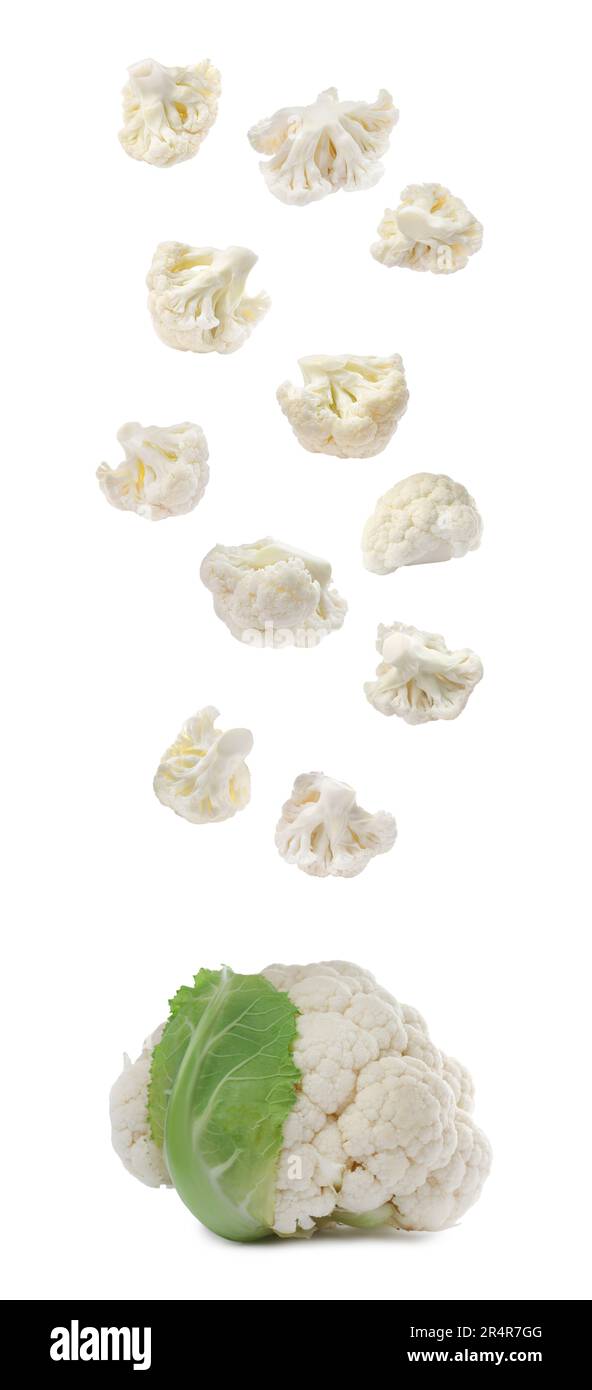 Many fresh cauliflower florets falling on white background Stock Photo