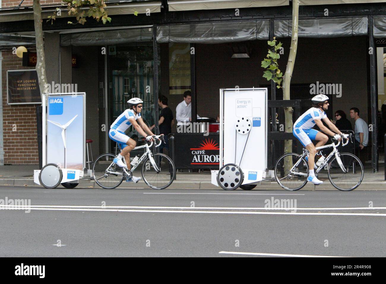 Moving advertising displayed on bicycles in Woolloomooloo in Sydney, Australia. Stock Photo