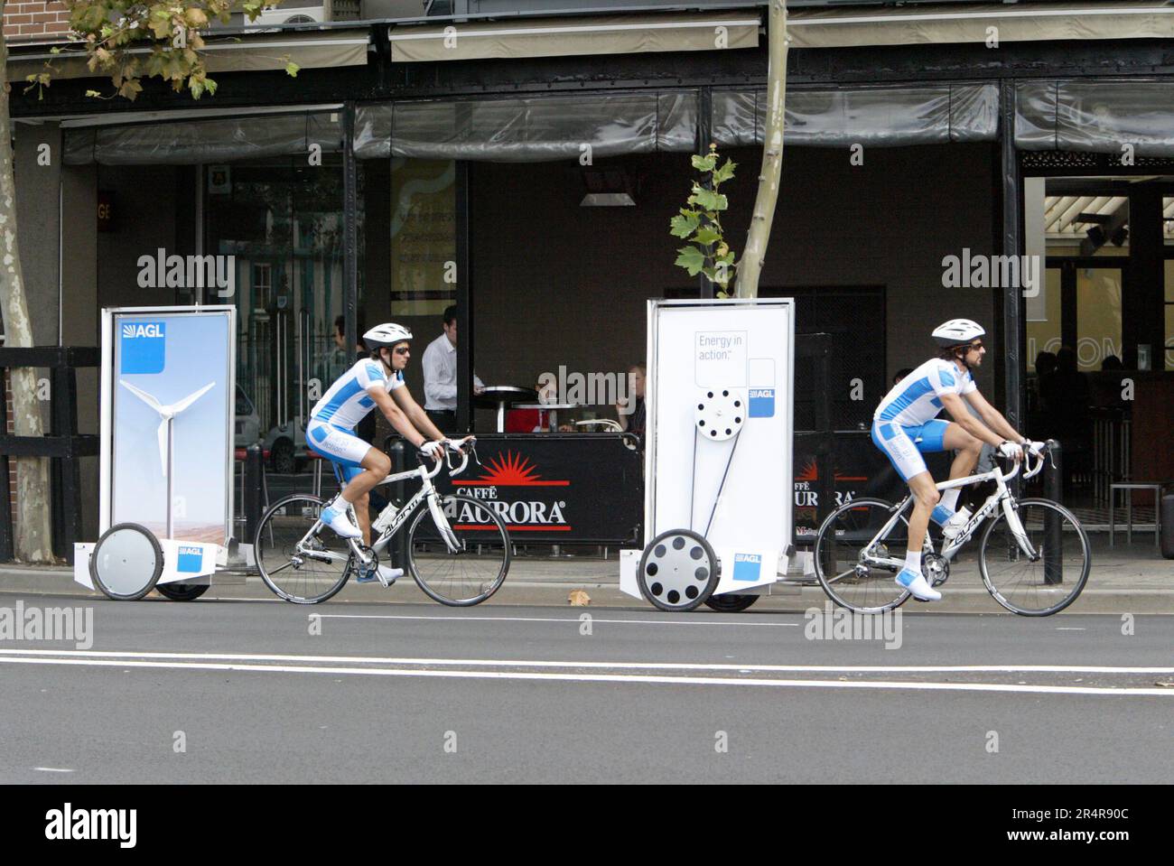 Moving advertising displayed on bicycles in Woolloomooloo in Sydney, Australia. Stock Photo
