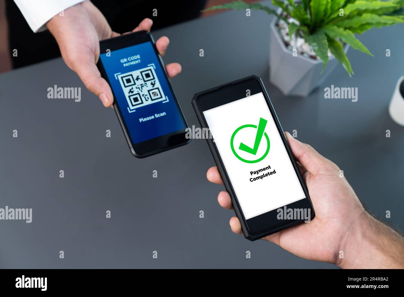 QR code displayed on screen for cashless payment scanning. Closeup ...