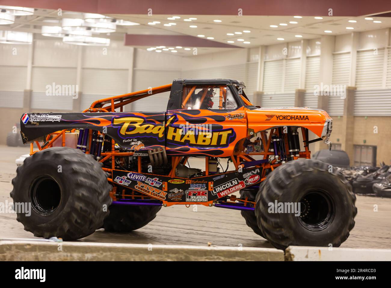 The monster truck 'Bad Habit,' a 1979 Ford F-250, performs at the Allen County War Memorial Coliseum Expo Center in Fort Wayne, Indiana, USA. Stock Photo