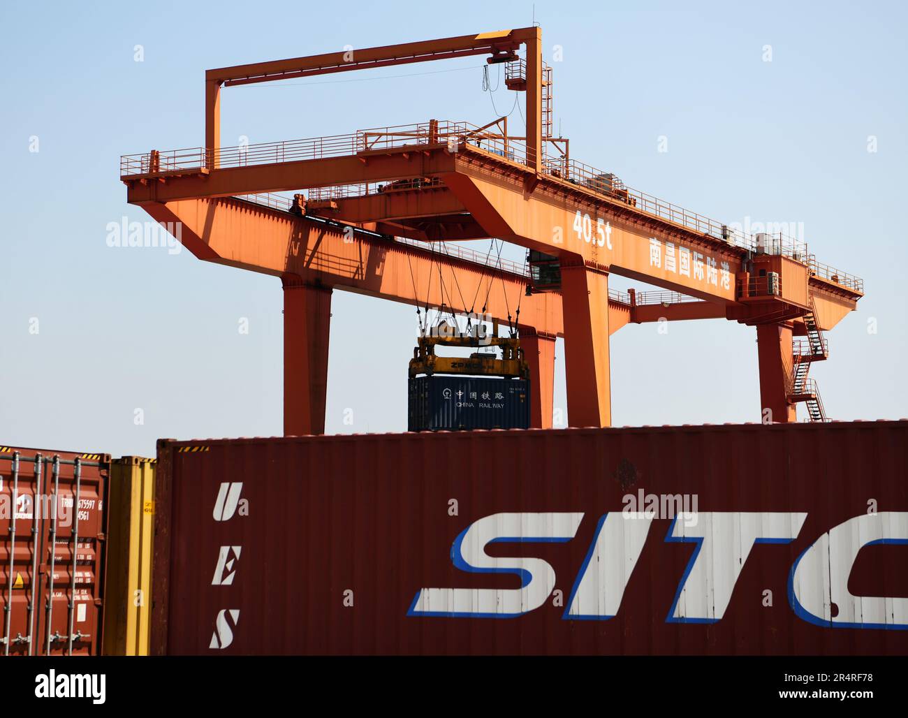 NANCHANG, CHINA - MAY 29, 2023 - A gantry crane lifts containers at the Nanchang International Land Port in Nanchang, Jiangxi province, China, on May Stock Photo