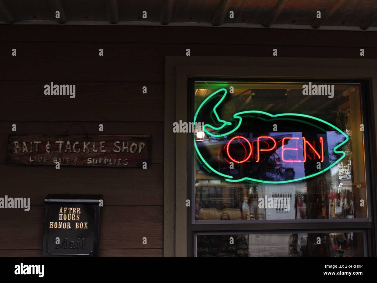 Neon Open Sign in Window of Rural Bait and Tackle Shop Rural East