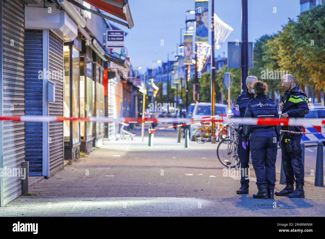 ROTTERDAM Police officers at a tea house on Schiedamseweg where an