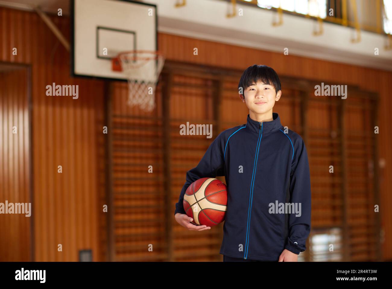 Japanese school kid playing basketball Stock Photo Alamy