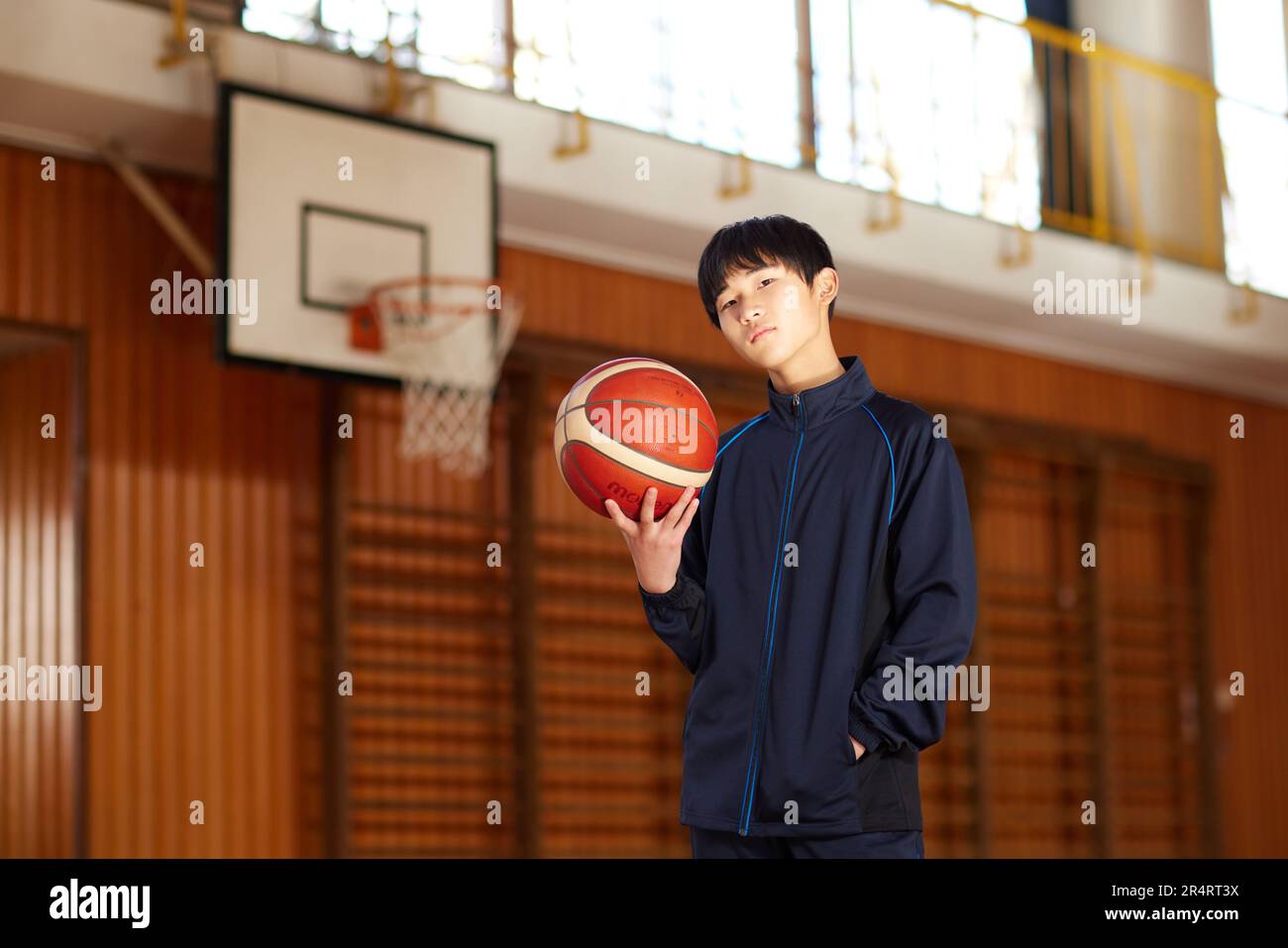 Japanese school kid playing basketball Stock Photo Alamy