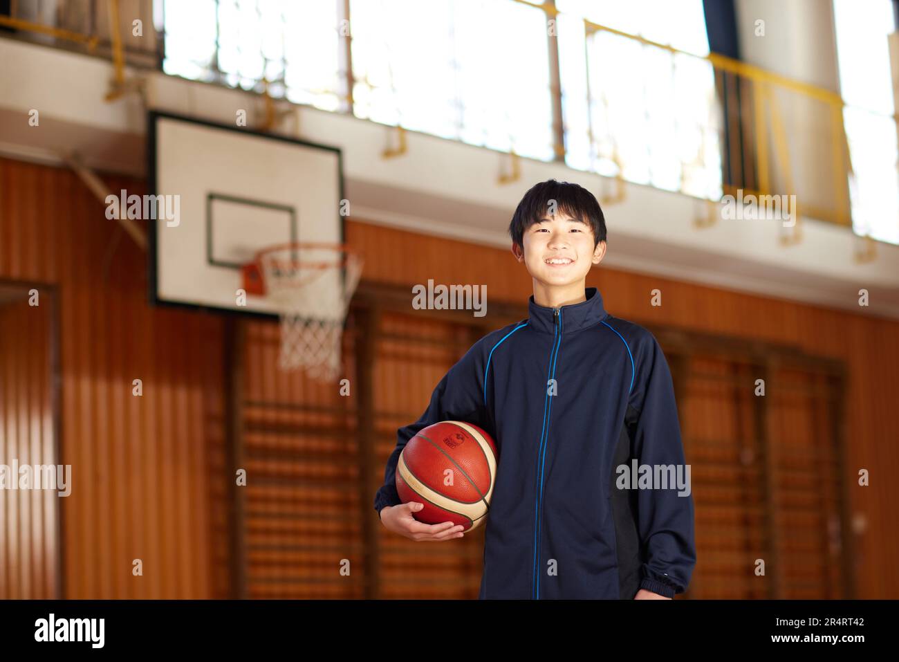 Japanese school kid playing basketball Stock Photo Alamy