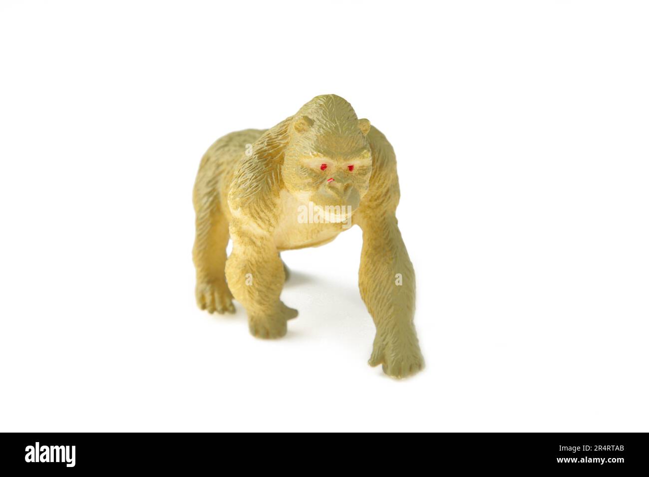 Toy gorilla isolated against on a white background. Top view Stock