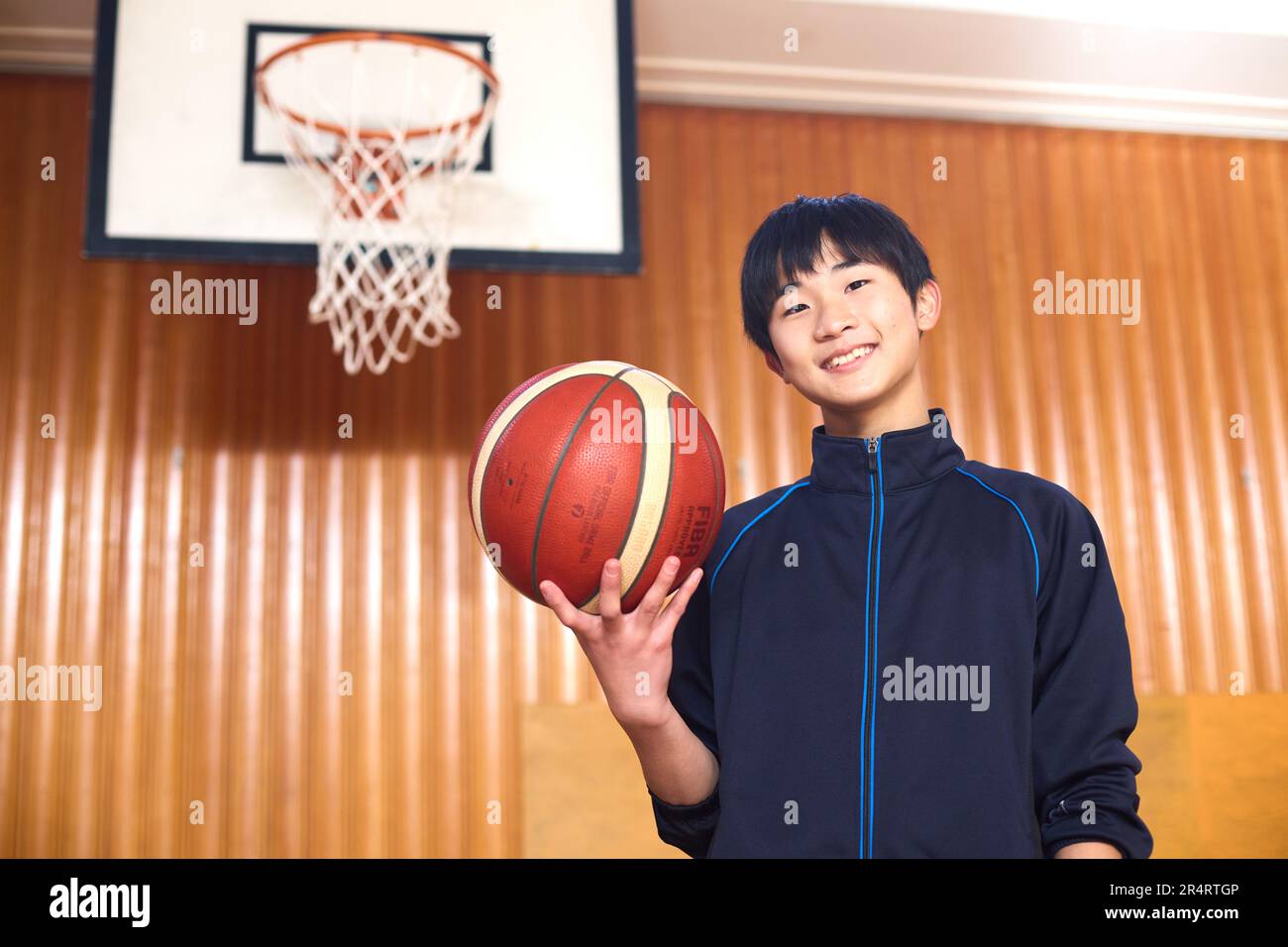Japanese school kid playing basketball Stock Photo Alamy