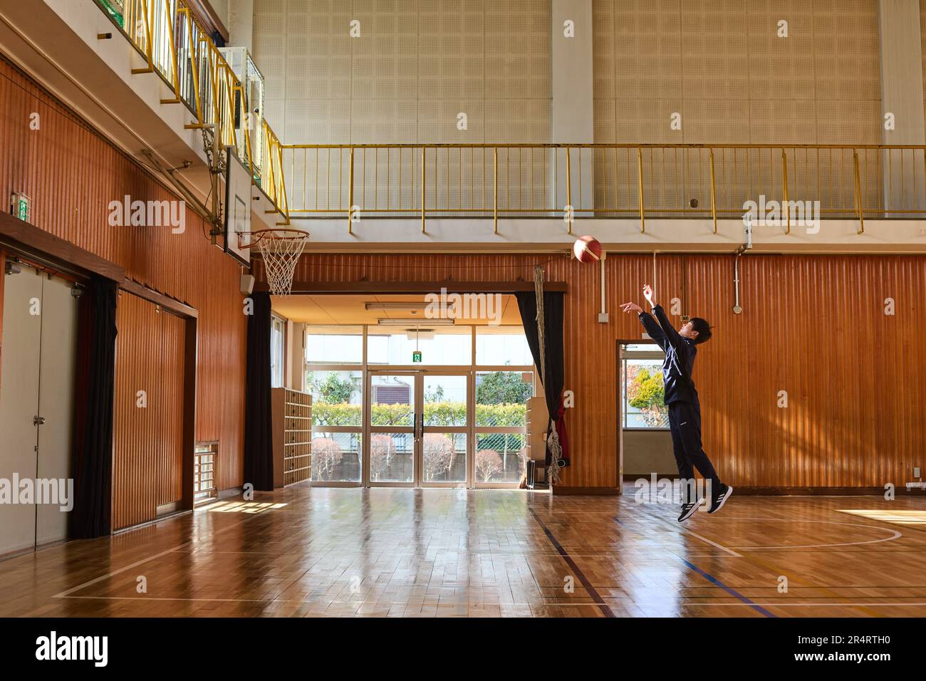 Japanese school kid playing basketball Stock Photo Alamy