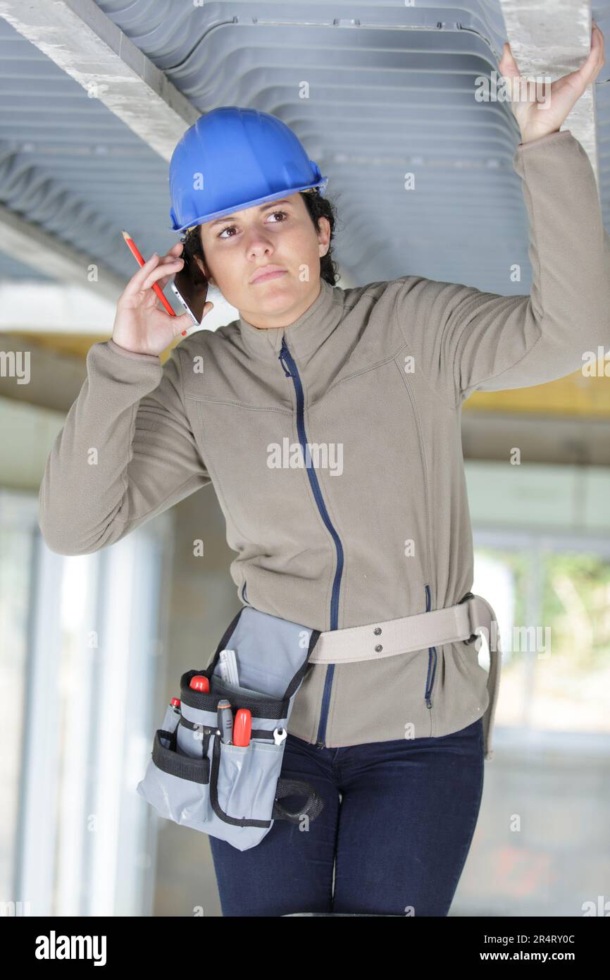 engineer with equipment at construction site Stock Photo