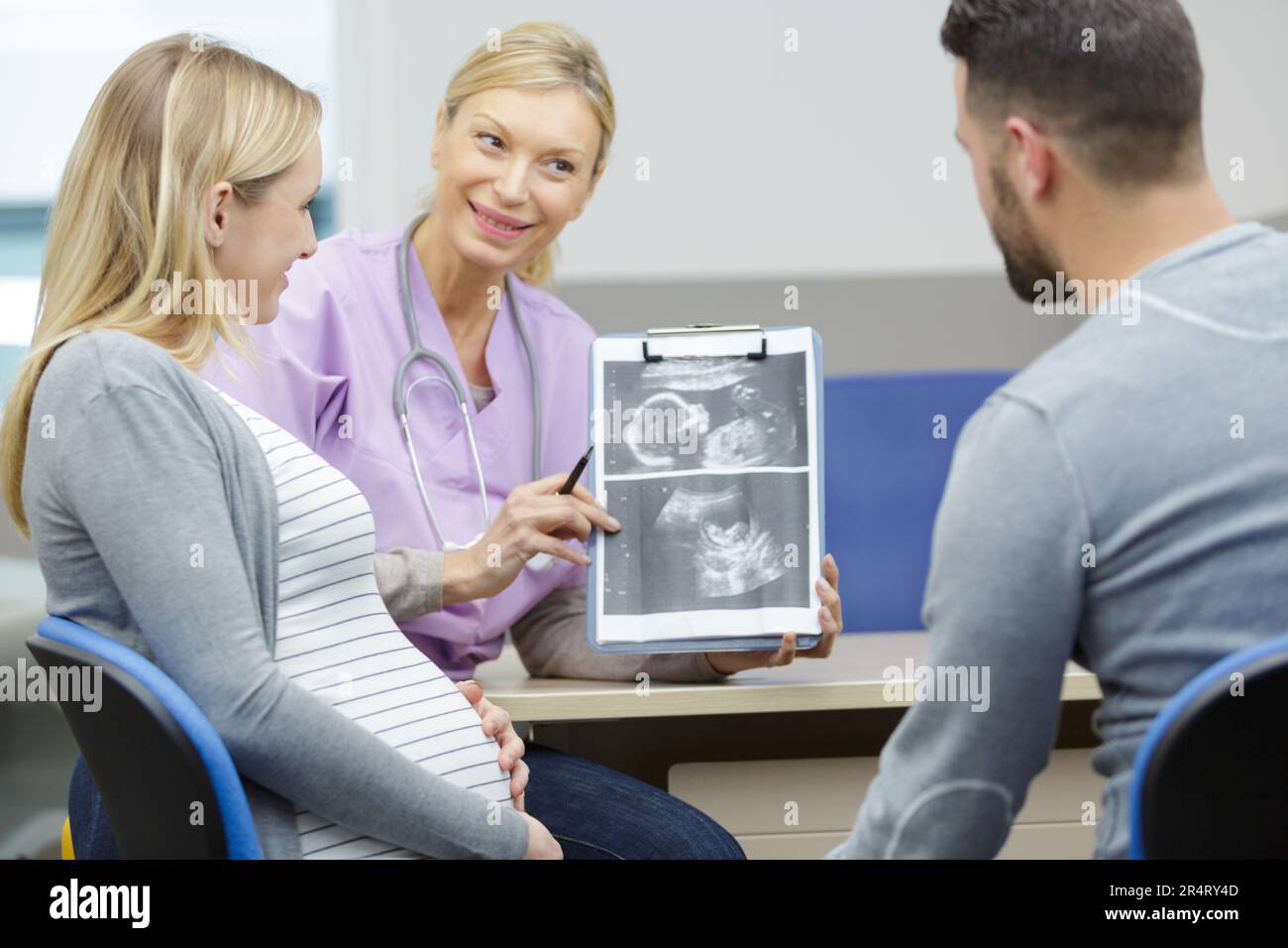 future parent with doctor at the hospital Stock Photo - Alamy
