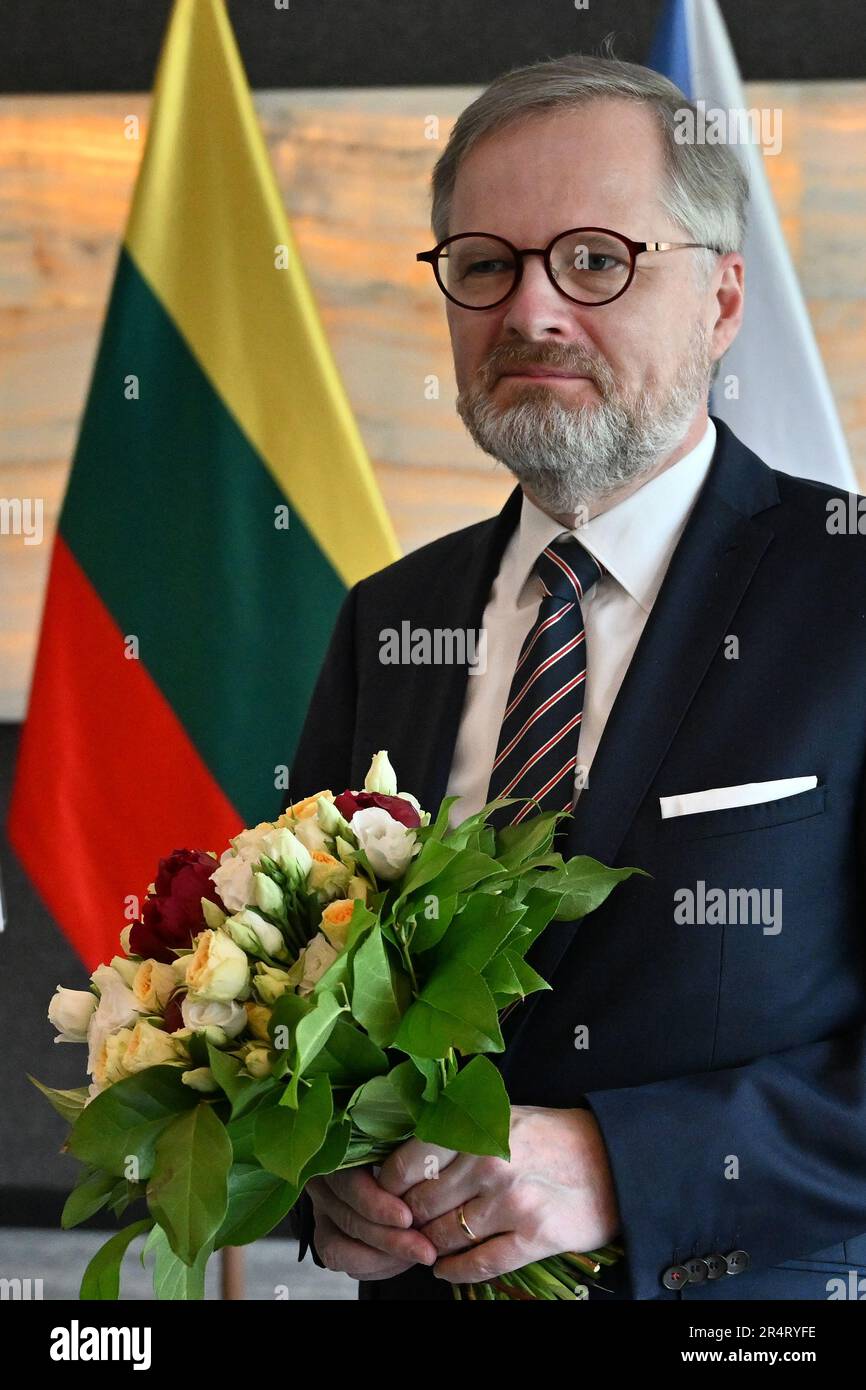 Brno, Czech Republic. 30th May, 2023. Czech Prime Minister Petr Fiala holds flowers before his meeting with Lithuanian counterpart Ingrida Simonyte in Brno, Czech Republic, May 30, 2023. Credit: CTK/Alamy Live News Stock Photo