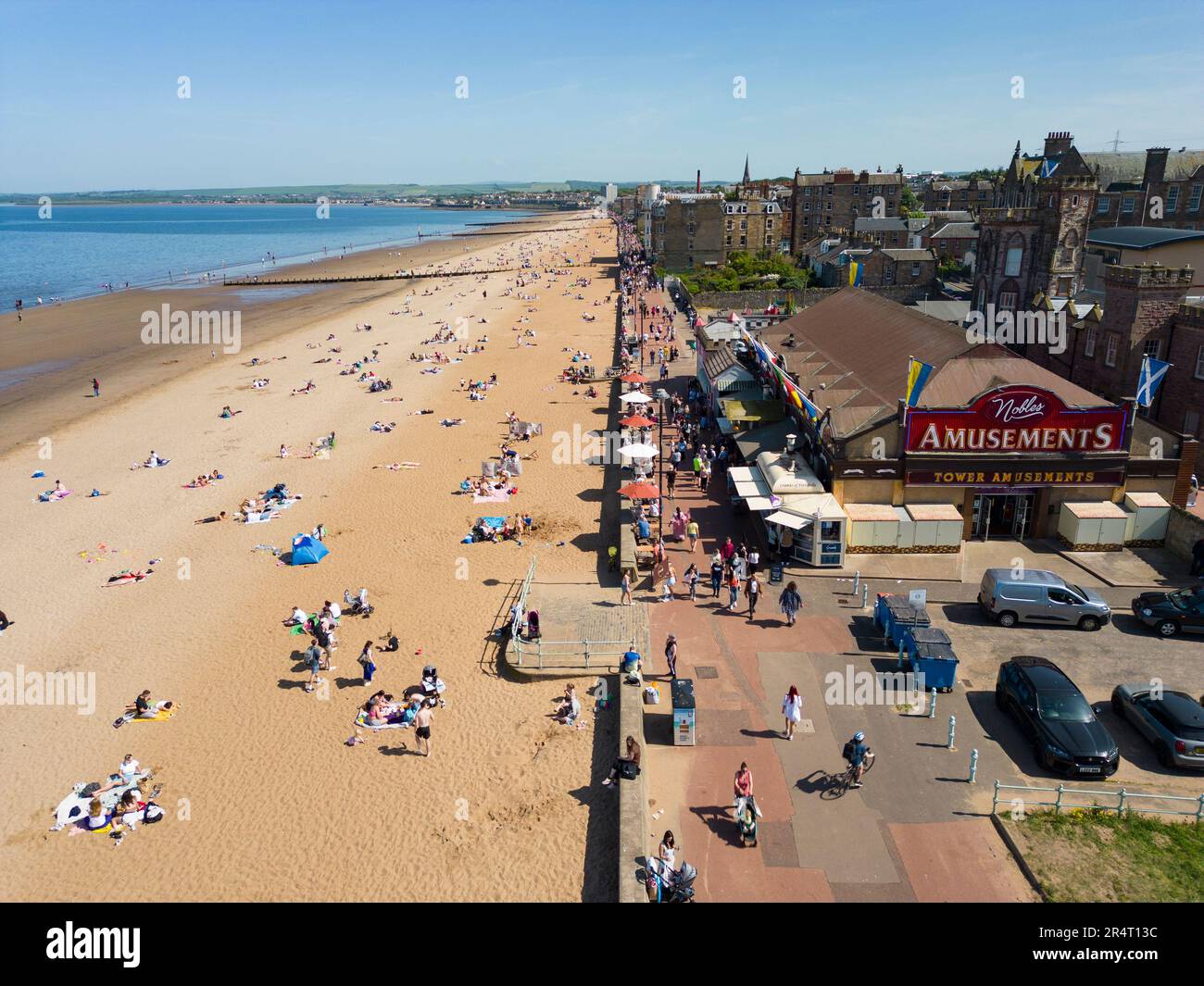 Aerial view of busy Portobello Beach and promenade on sunny day, Edinburgh, Scotland UK Stock Photo