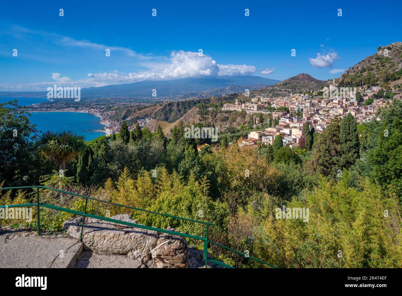 View of Taormina and Mount Etna from the Greek Theatre, Taormina, Sicily, Italy, Europe Stock Photo