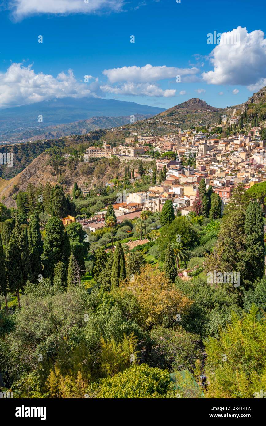 View of Taormina with Mount Etna in background from the Greek Theatre, Taormina, Sicily, Italy, Europe Stock Photo