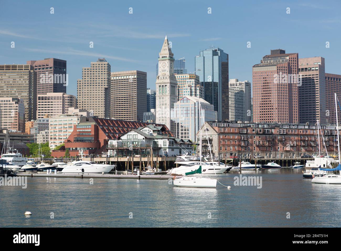 USA, Massachusetts, Boston, Boston Skyline from water with harbor boats. Stock Photo