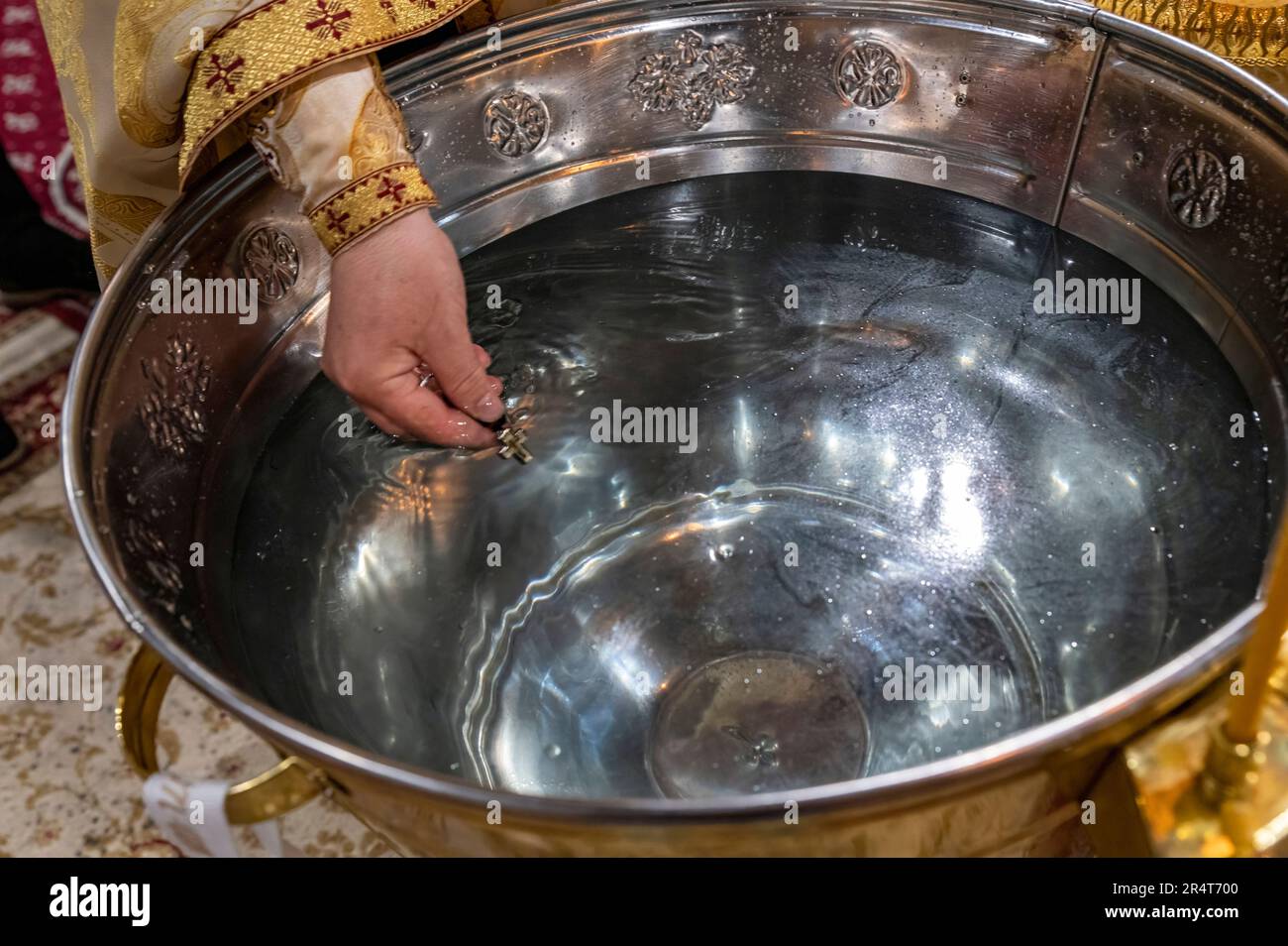 baptismal font with water for the Orthodox baptism in the church, with