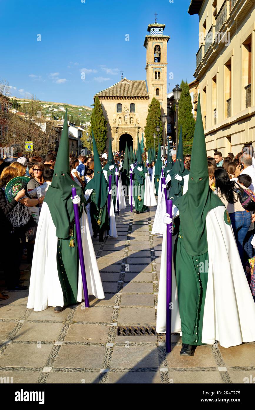 Andalusia Spain. Procession at the Semana Santa (Holy week) in Granada. The characteristic pointed hood (capirotes) worn by the penitents Stock Photo