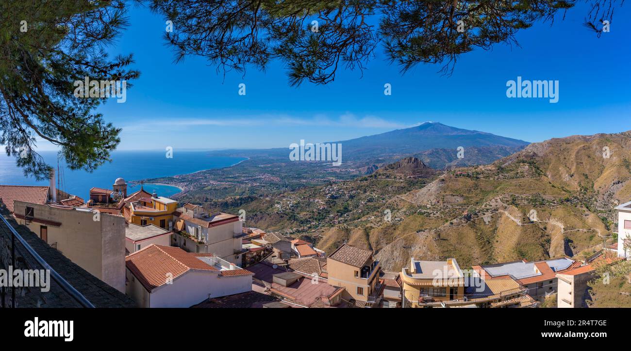 View of Castelmola with Mount Etna in background, Taormina, Sicily, Italy, Europe Stock Photo