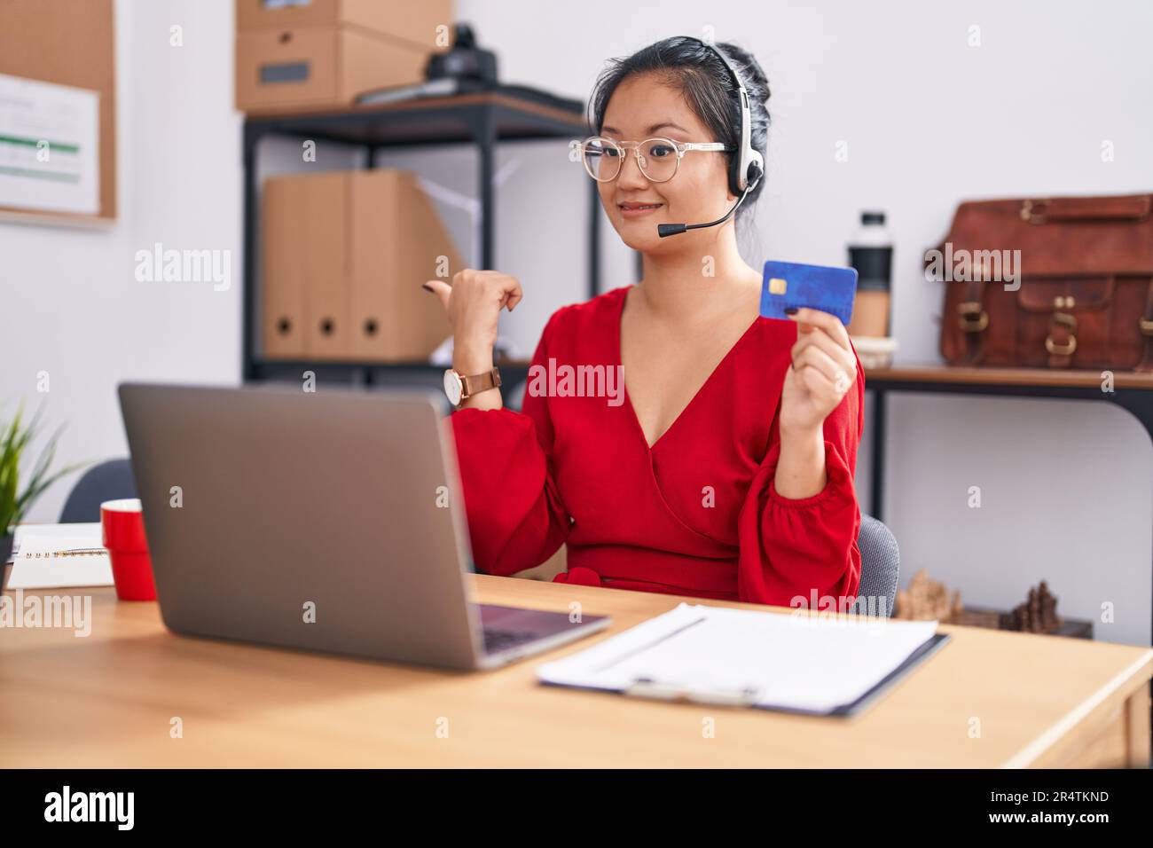 Woman glasses using thumb hi-res stock photography and images - Alamy