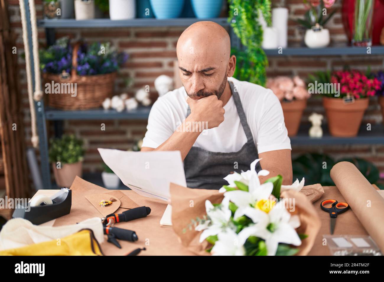 Young bald man florist hi res stock photography and images Alamy
