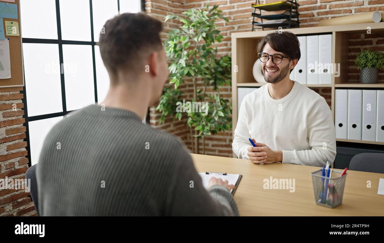 Business partners sign contract two hi-res stock photography and images ...