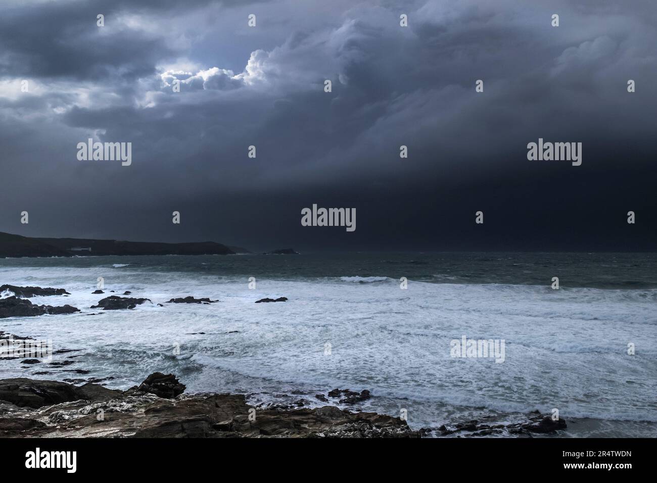 UK weather Storm Claudio approaching the coast over Newquay Bay in Cornwall in England in the UK. Stock Photo