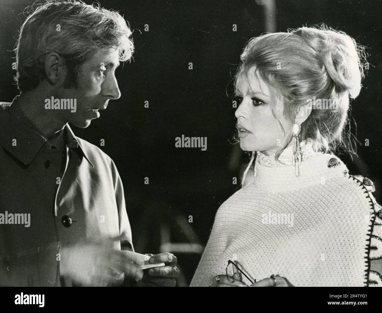French actress Brigitte Bardot and actor Patrick Gilles in the movie The Bear and the Doll, France 1970 Stock Photo