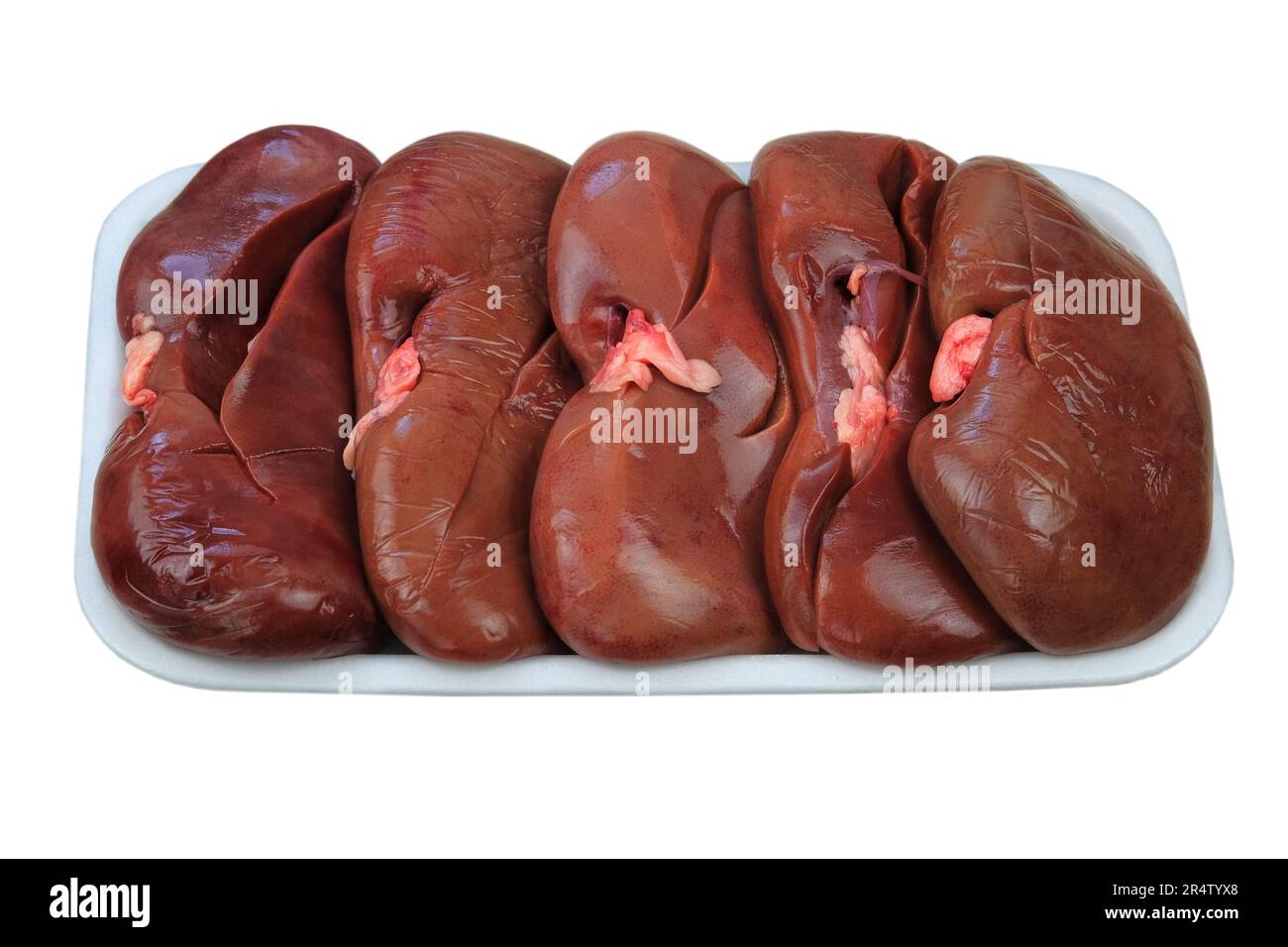 Raw pork kidneys in board isolated on white background. Raw meat offal. Stock Photo