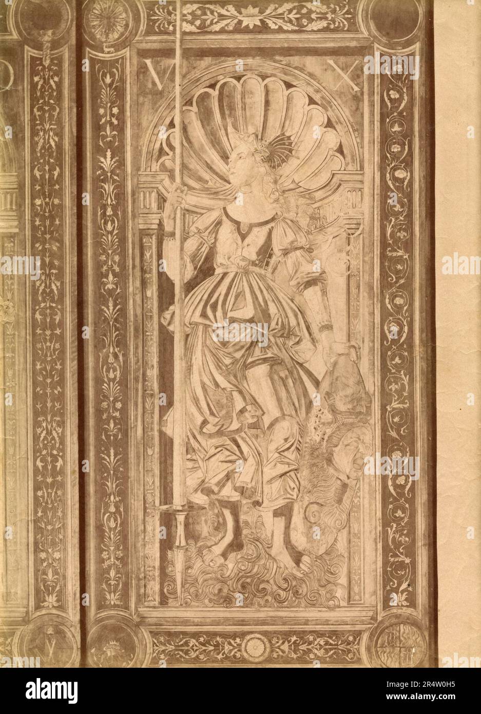 Carving of a door with allegorical figure, artwork by Italian artist Botticelli, Palazzo Ducale, Urbino, Italy 1900s Stock Photo