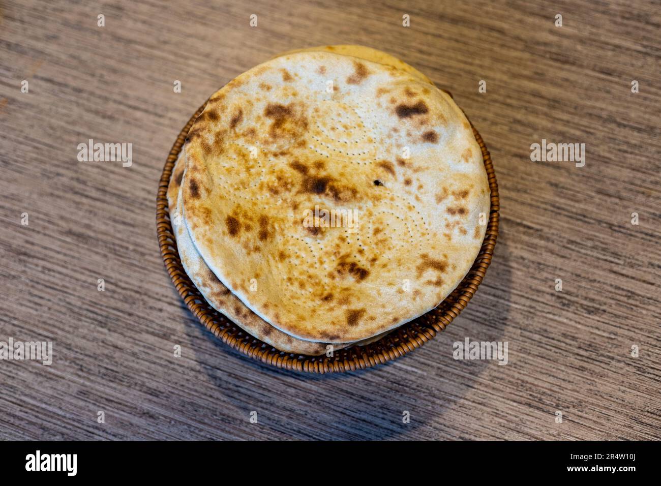 Tandoori roti on a wooden table background closeup Stock Photo