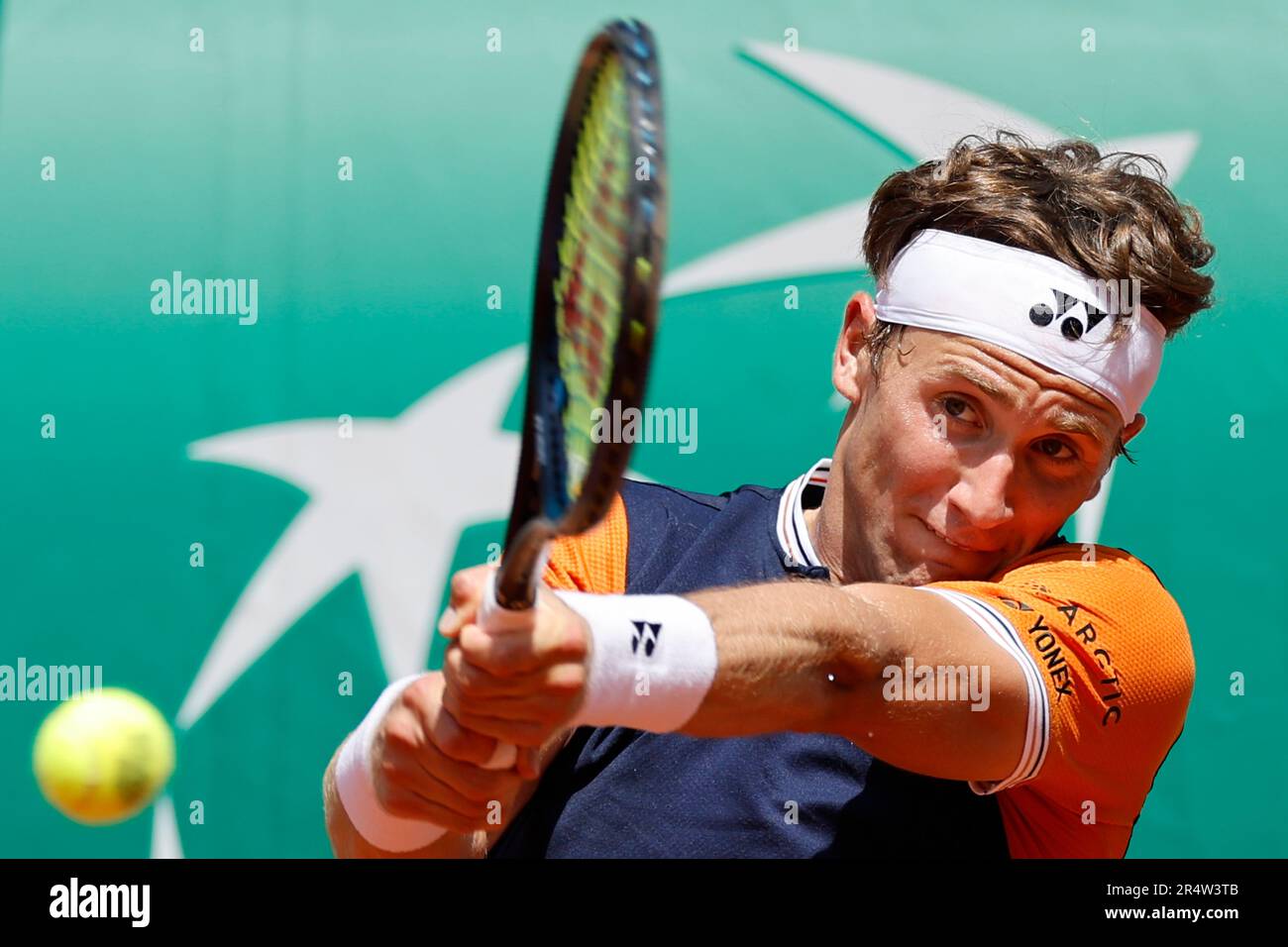 Norways Casper Ruud plays a shot against Swedens Elias Ymer during their first round match of the French Open tennis tournament at the Roland Garros stadium in Paris, Tuesday, May 30, 2023