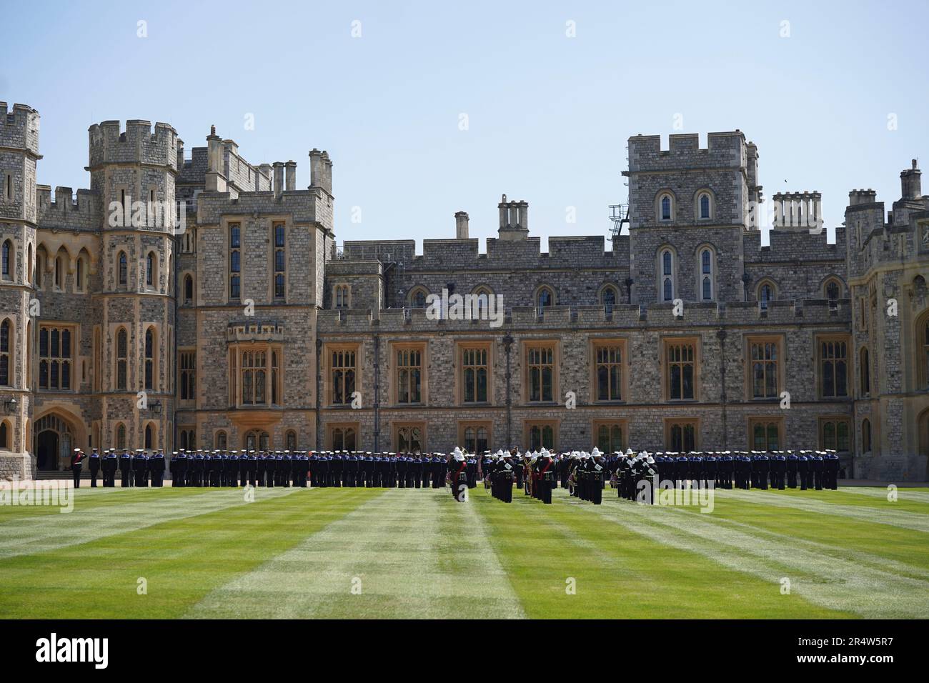 Royal Navy personnel enter the quadrangle at Windsor Castle, prior to