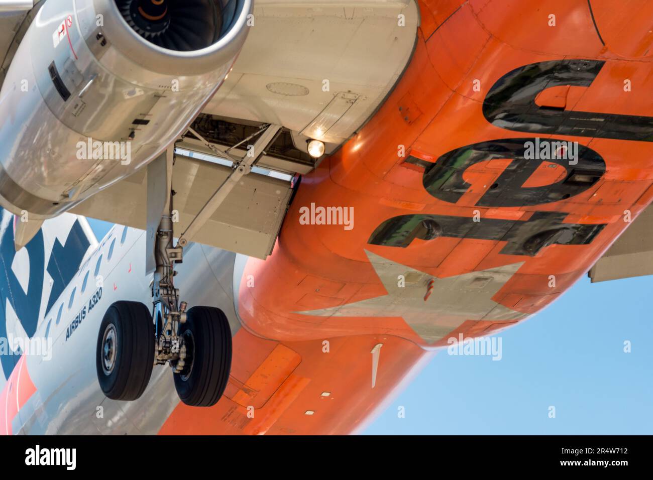 commercial planes flying near airport Stock Photo Alamy