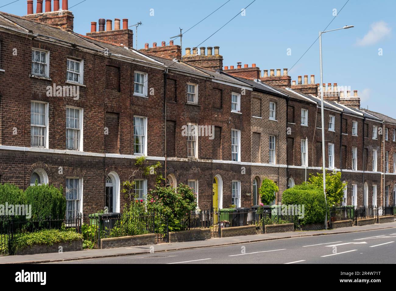 Threestorey terraced housing on London Road, King's Lynn Stock Photo