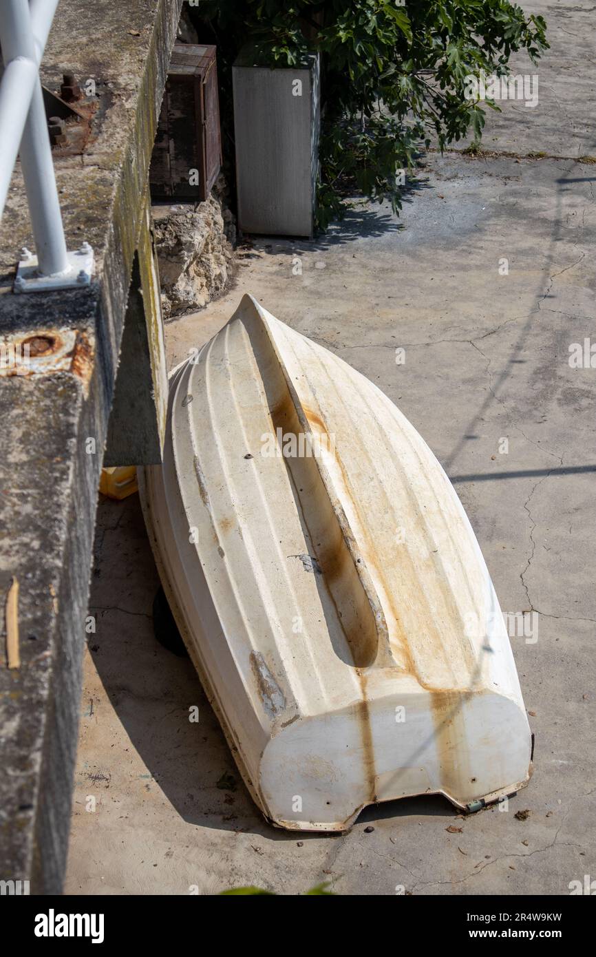 Rusty white boat in Lovran Stock Photo