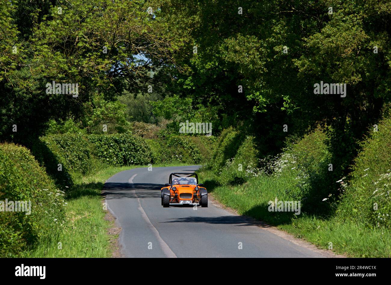 Westfield sports car on single track Breighton Road, East Yorkshire, England UK Stock Photo