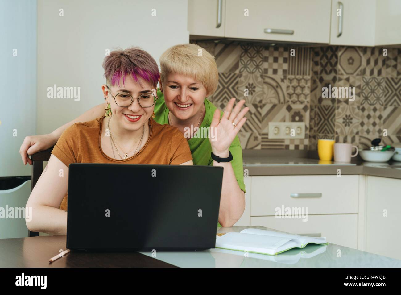 Video two beautiful women using hi-res stock photography and images - Alamy