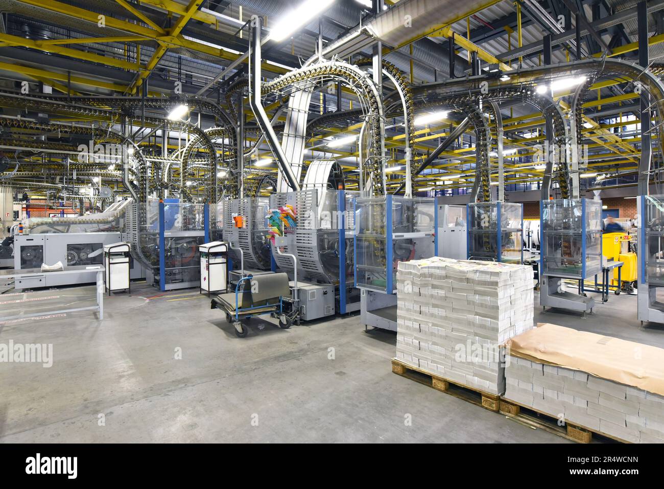 modern machines for transportation in a large print shop for production