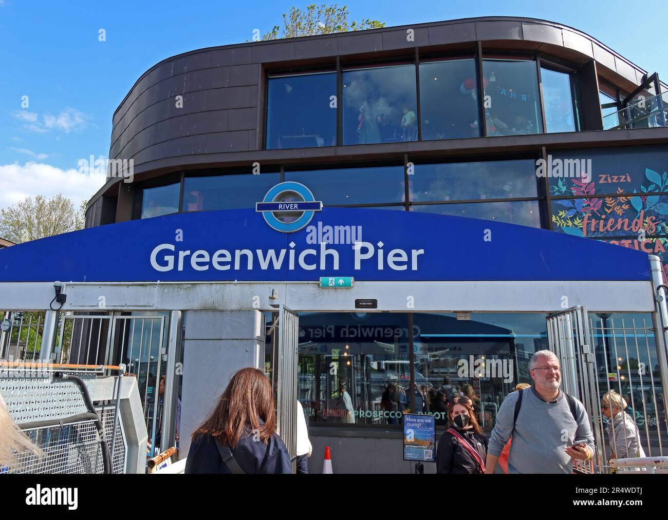 Entrance to Greenwich Pier on the River Thames in London, serving TfL River Bus and Thames river boat services for commuters and tourists Stock Photo
