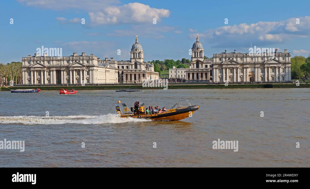 A Thames RIB speedboat passes in front of the National Maritime Museum at Greenwich, London, with passengers enjoying a sightseeing trip along Thames Stock Photo