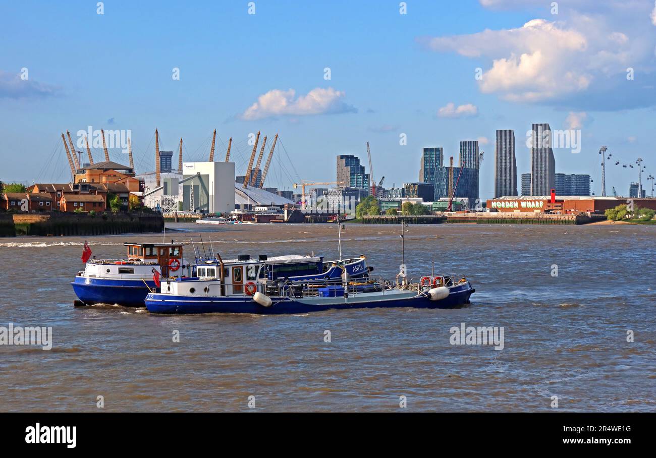 View across the River Thames from Greenwich toward the O2 Arena at North Greenwich and the modern Canary Wharf skyline in East London Stock Photo